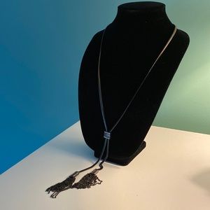 Sleek black metallic necklace with sparkling details; approx 26 inches long